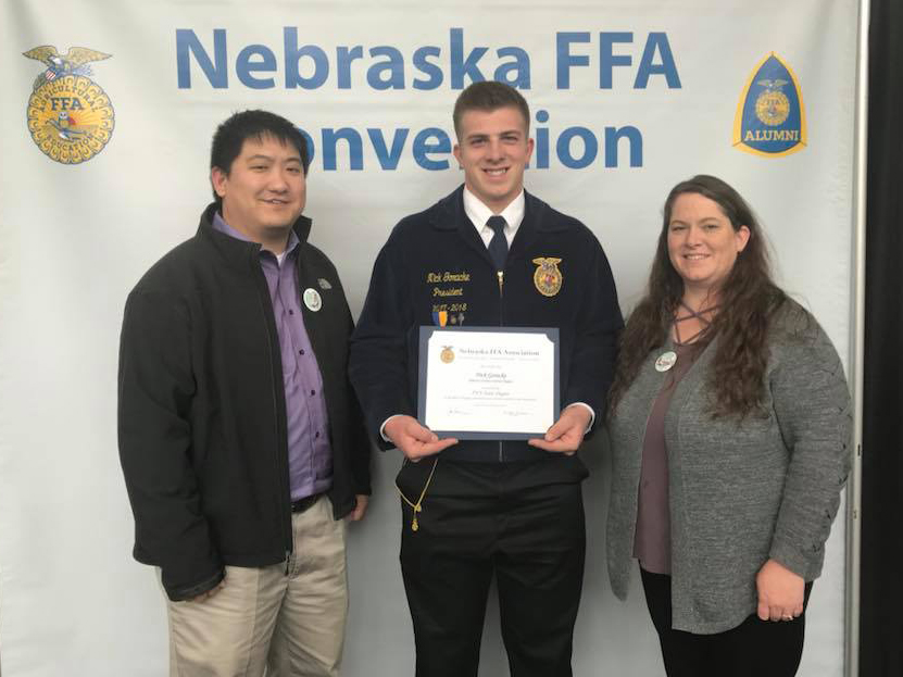 Nick Goracke received his State Degree (centered), pictured with Marcus Scheer and Christy Hodges