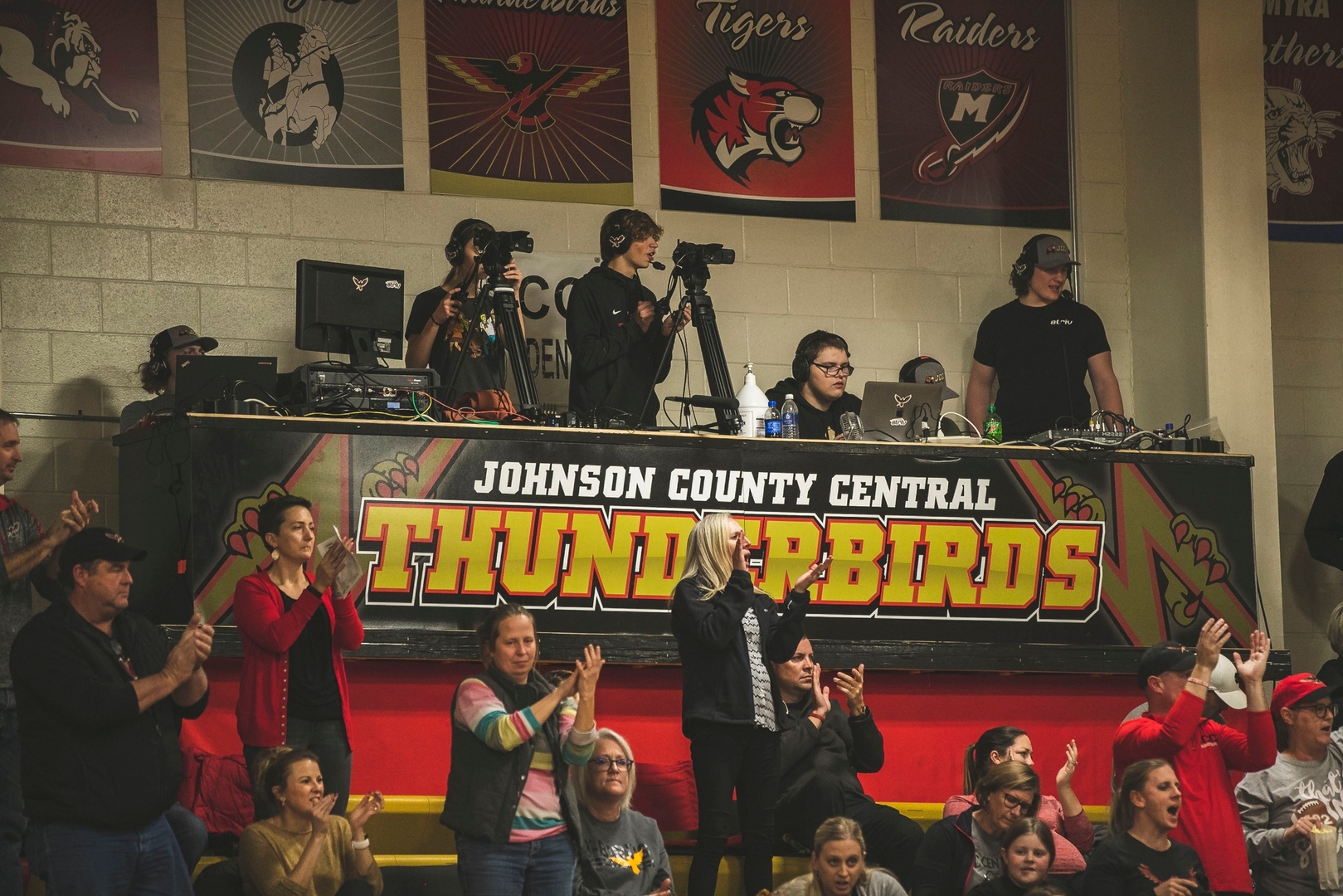 Striv Crew working on the platform during a basketball game