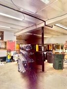 Weight room with equipment removed to house equipment to be installed.